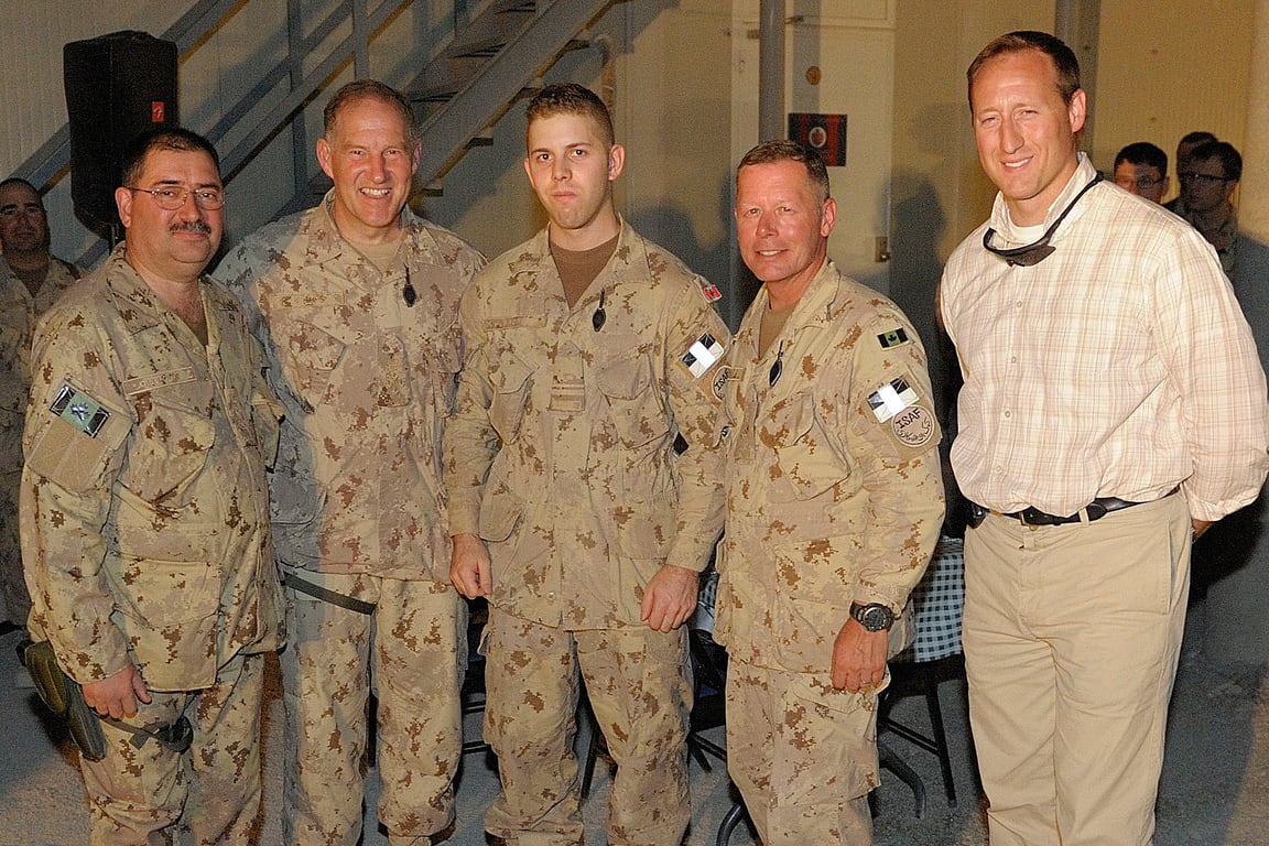 The author standing with senior officers and the Minister of National Defence